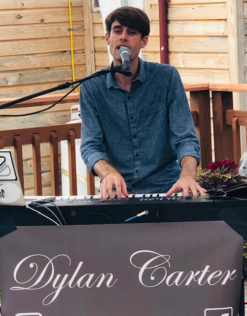 Dylan Carter Returns to Four Sisters Winery