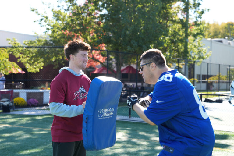 Rider students volunteer at sports clinic